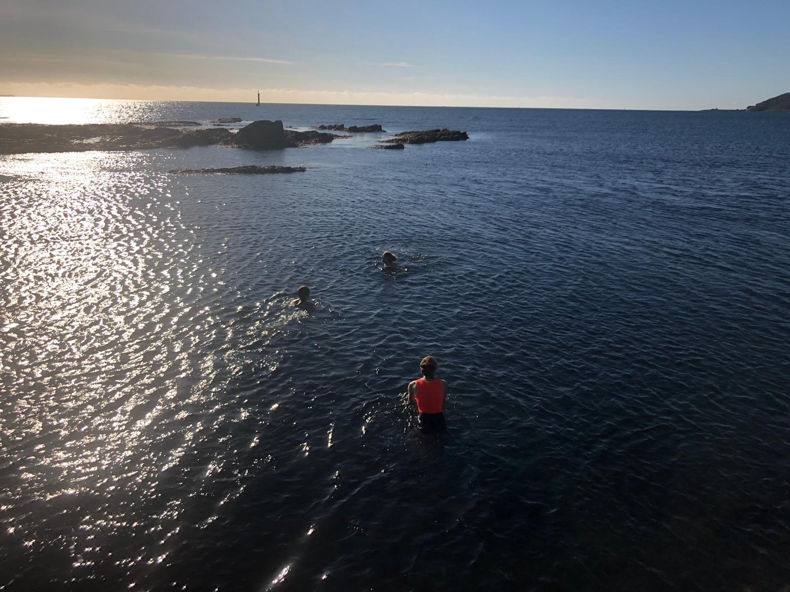 Sea swimmers enter the water 